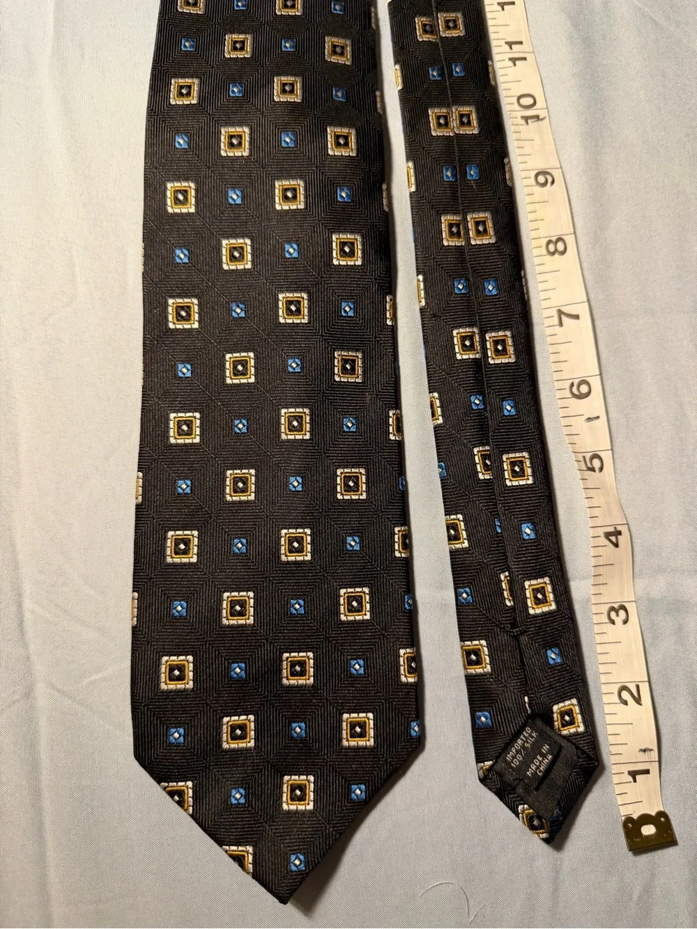 Jos. A. Bank Black Tie with Blue and Gold Geometric Squares